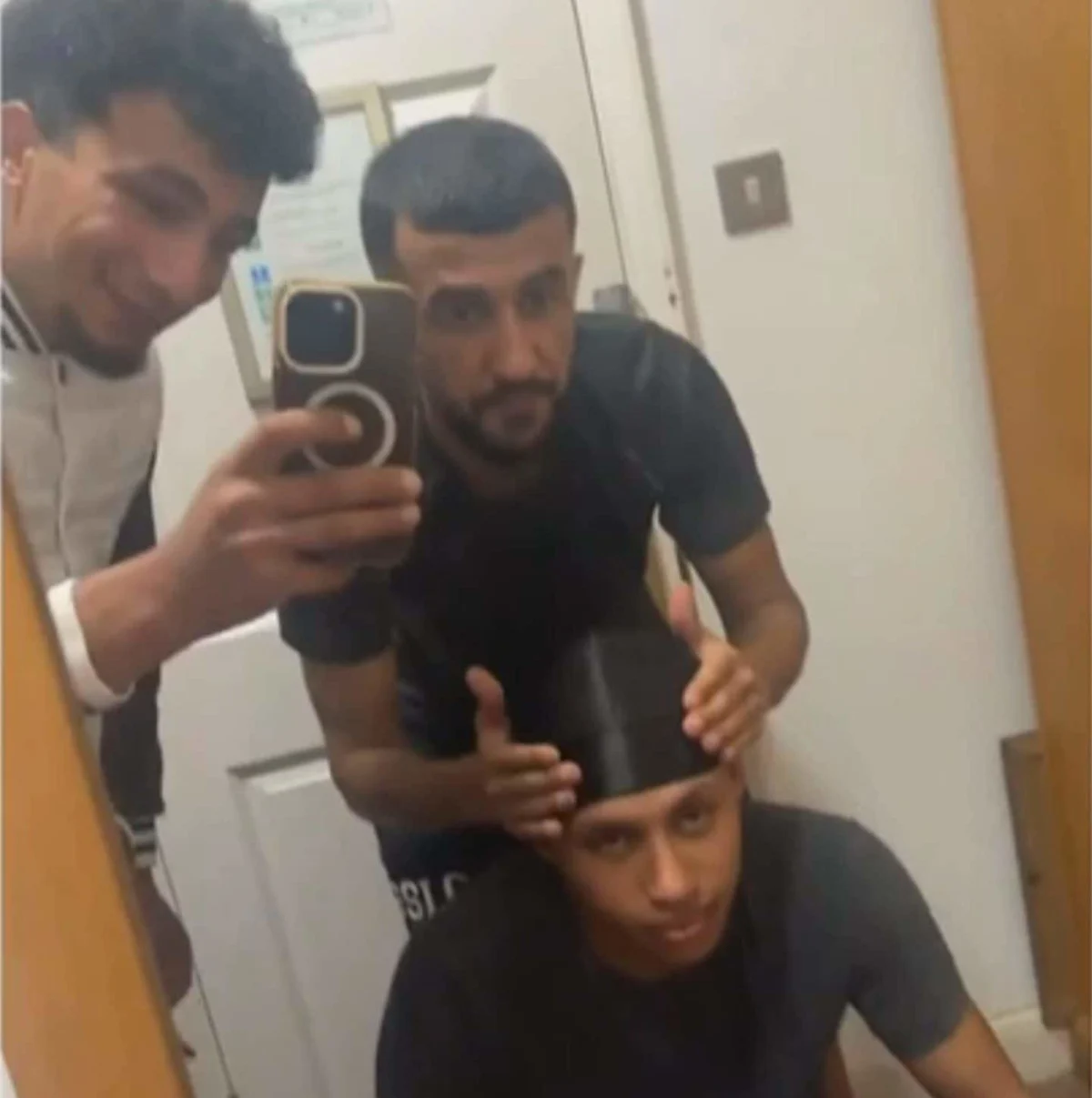 A sombre image of Brighton beach, with a hint of colour and a sense of community, as the town comes to terms with the recent gang rape incident, with the primary keyword being Brighton beach gang rape