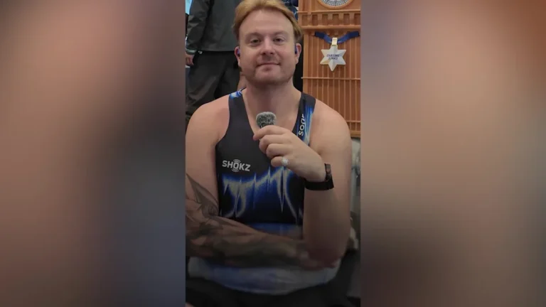 A man running a marathon, having overcome sepsis and cancer, with a determined look on his face, symbolising hope and survival, with a beautiful colourful background