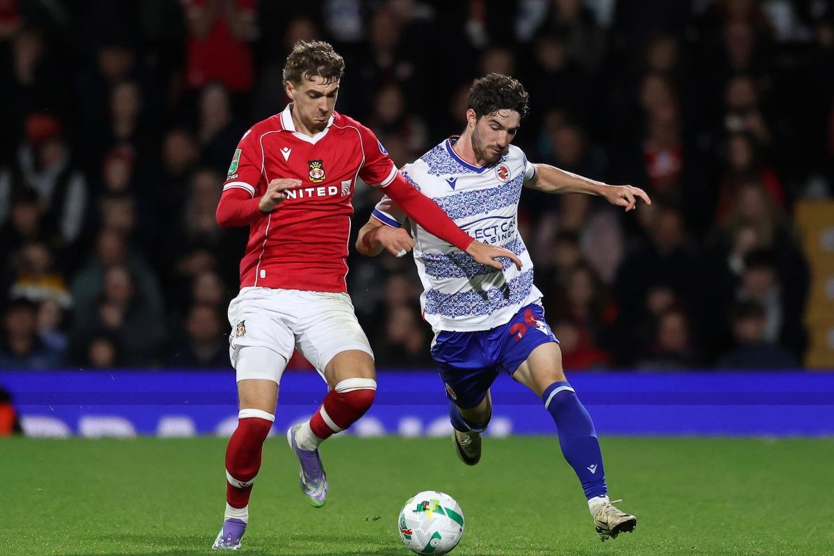 EFL trophy with football stadium background