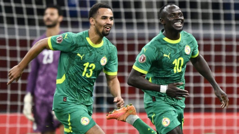 Senegal players celebrate Africa Cup win