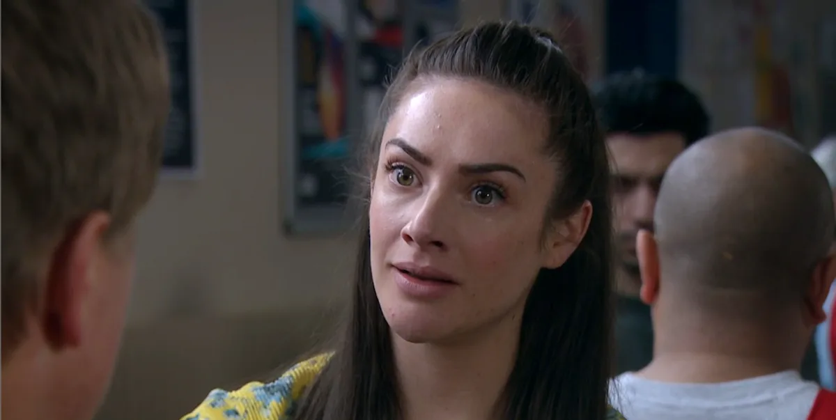 A dramatic scene from Emmerdale, featuring Victoria and Moira, with a stunning Yorkshire countryside backdrop, colourful characters and shocking plot twists