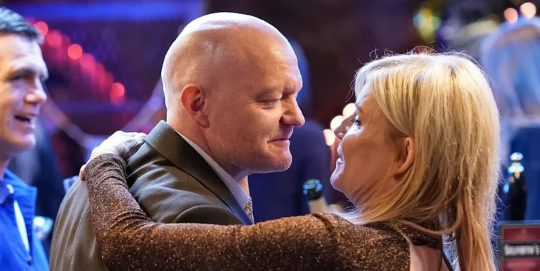 A dramatic scene from EastEnders featuring Max and Cindy, with a shocked expression on their faces, surrounded by a colourful and intricate background, highlighting the complex relationships and behaviour of the characters, with a focus on the primary keyword phrase 'EastEnders love triangle'