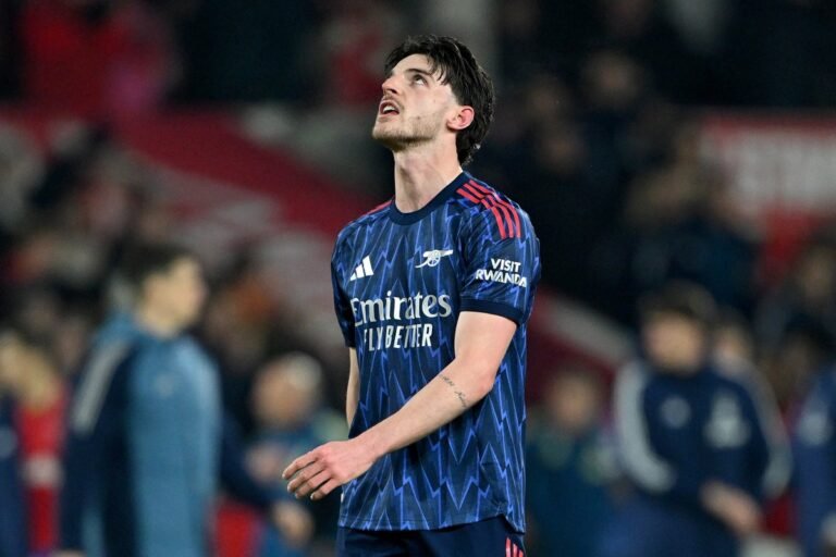 Arsenal players in action during Premier League match