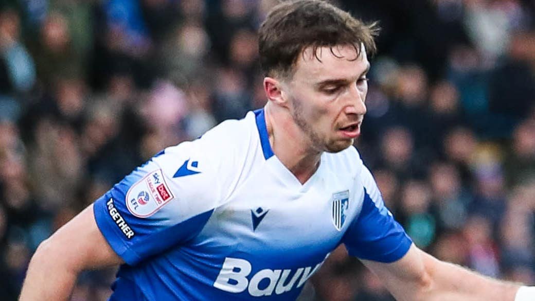 Gillingham players celebrate their win