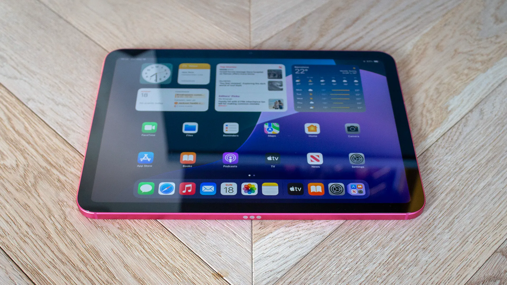 Apple iPad with a brightly colored background, highlighting the device's sleek design and vibrant colors, with the primary keyword 'iPad Neo' naturally included