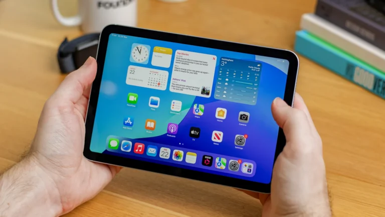 The iPhone Ultra, a foldable phone with a 4:3 aspect ratio, featuring a large screen and improved multitasking capabilities, perfect for productivity and usability in the UK
