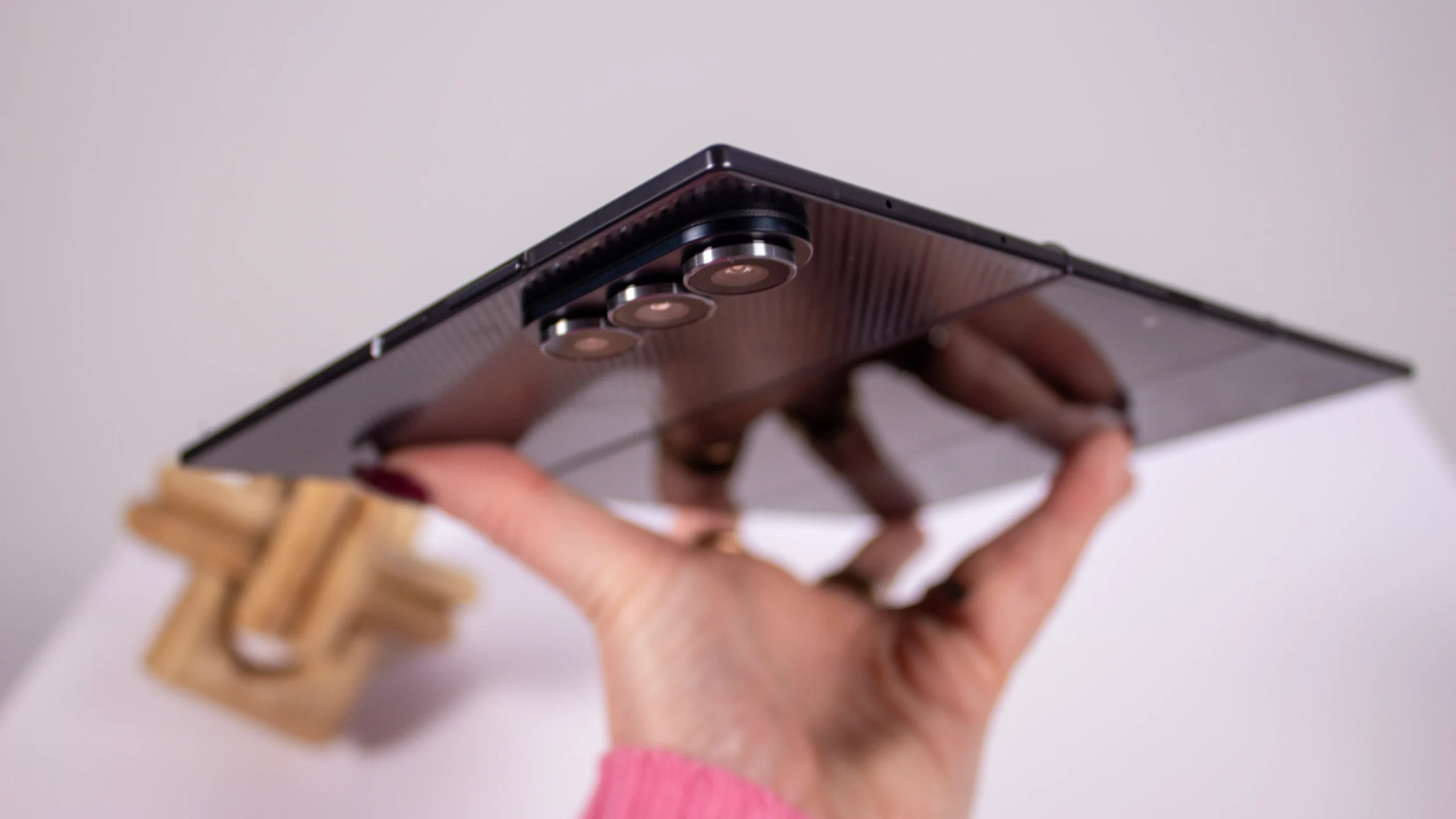 The iPhone Ultra Fold is a foldable smartphone with a 7.58-inch inner display and a 5.25/5.5-inch outer display, featuring a aluminium and titanium frame, with a range of specs and features that make it a top-of-the-line device, including a 12GB RAM, three tiers of storage, and a robust hinge composed of LiquidMetal, available in the UK with a range of pricing options