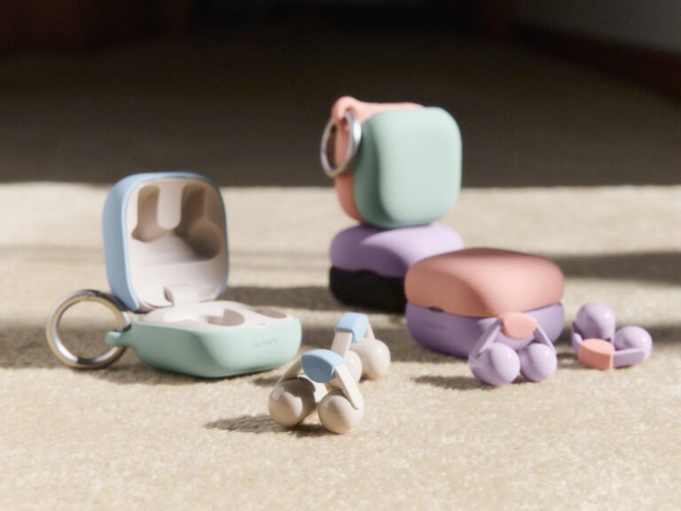 A group of business professionals analysing financial data and discussing UK business finance options, with a focus on responsible financial behaviour and corporate funding