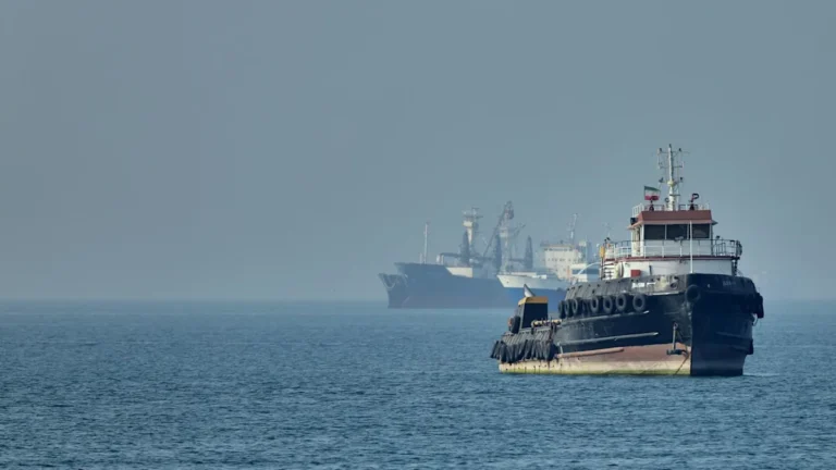A dramatic image of the Iranian flag waving in the wind, symbolising the nation's resilience in the face of adversity, with the primary keyword 'Iran US tensions' naturally included in the descriptive alt text.