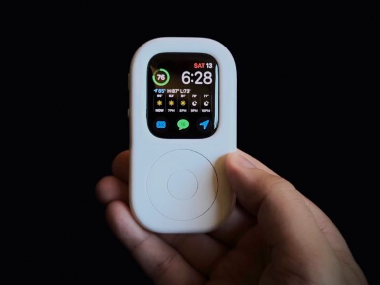 The Apple Pin, a compact AI gadget with two cameras, three microphones, and a speaker, all housed in a sleek AirTag form factor, showcasing its advanced features and potential to analyse and understand its surroundings, with a modern colour scheme and design