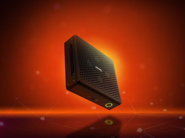 The Zotac Magnus EAMAX mini PC, featuring a compact 2.65-litre chassis, powered by AMD Strix Halo APUs, with up to 128GB of LPDDR5X memory, ideal for 1080p gaming and local AI workloads, showcasing its sleek design and impressive specs