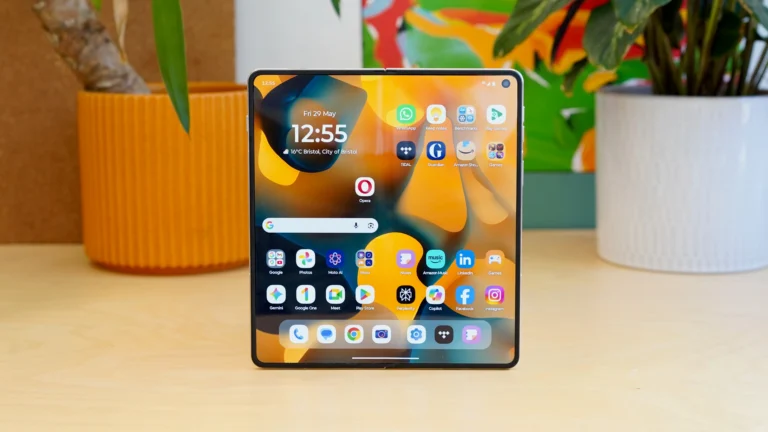 The Motorola Razr Fold, a luxurious and tactile foldable phone with a large 6.56in outer display and 8.09in inner display, featuring a stunning 50Mp camera system and long-lasting 6000mAh battery