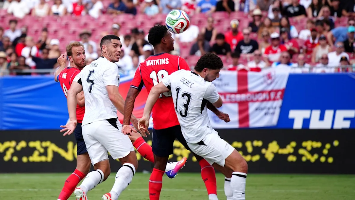 England and Scotland players celebrating their wins in World Cup warm-up games, with the teams demonstrating their skills and teamwork, and the colour and atmosphere of the tournament being a true celebration of football