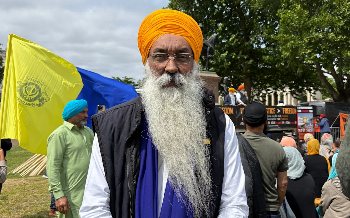 A Sikh leader is pictured speaking to a crowd, with a backdrop of the Amritsar temple, highlighting the primary keyword phrase 'Sikh leader' and the 'Amritsar temple massacre'
