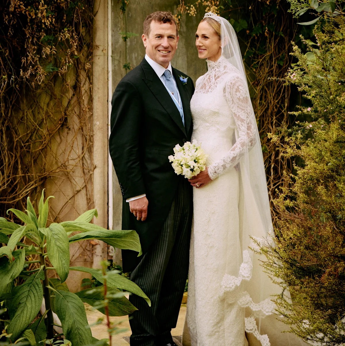 Peter and Harriet Phillips' official wedding portraits, showcasing the love and happiness of the royal couple on their special day, with beautiful colours and heartfelt behaviour