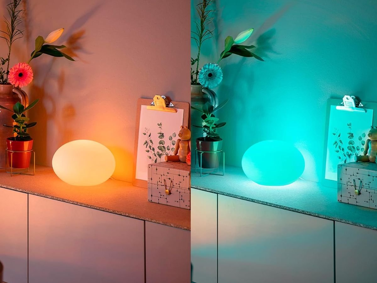 The new Philips Hue Flourish table light, featuring a sleek design and advanced smart lighting technology, including Matter compatibility and MotionAware functionality, perfect for creating a comfortable and energy-efficient living environment with Philips Hue