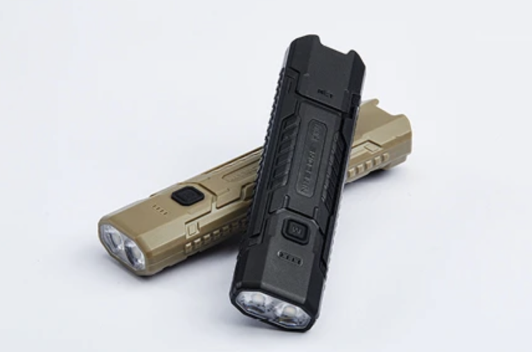 The Nitecore EDC07 flashlight, a compact and powerful device with switchable colour temperatures, shown in a outdoor setting with a beautiful natural colour palette, highlighting its exceptional colour rendering capabilities