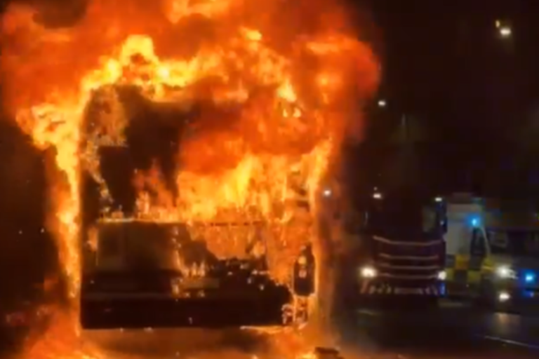 Edinburgh bus fire: a burning bus in the city centre with fire crews responding quickly to the emergency, highlighting the importance of public transport safety and the role of emergency services