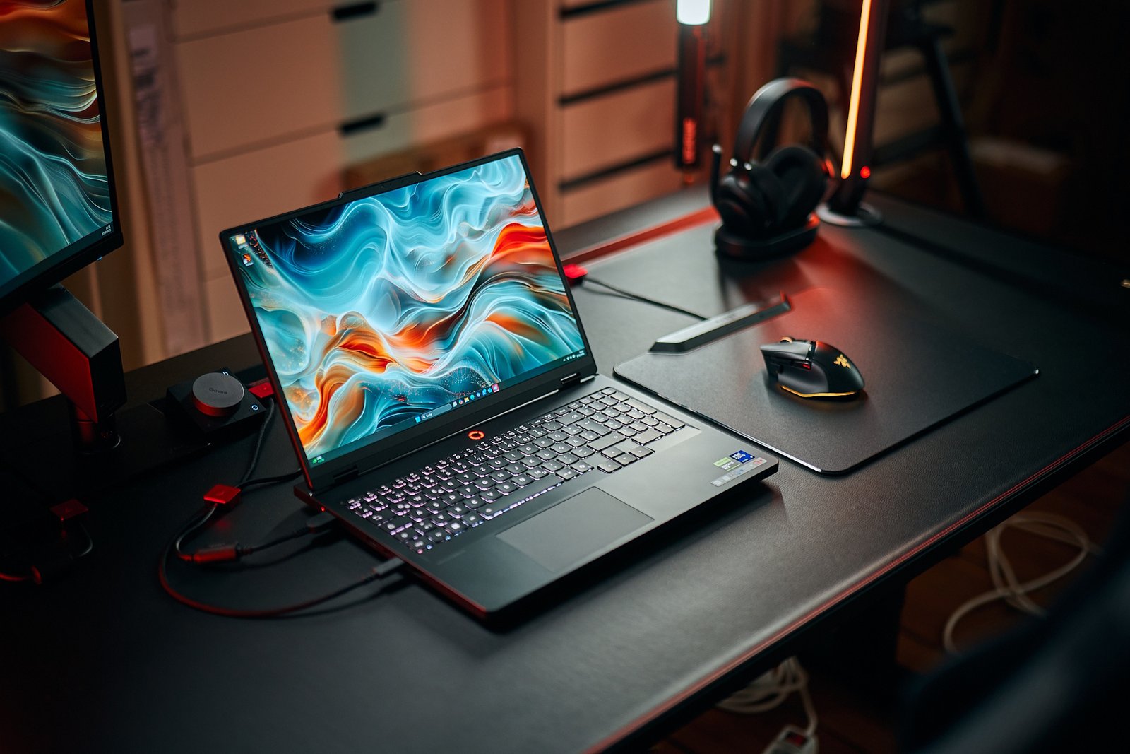 Lenovo Legion Pro 5 gaming laptop with 16-inch OLED display, Ryzen 9 9955HX processor, 32 GB RAM, and RTX 5070 Laptop GPU, featuring a sleek and sophisticated design with vibrant colour and razor-sharp detail