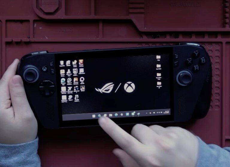 A close-up of the Asus ROG Xbox Ally X with its upgraded 64 GB LPDDR5X-8533 RAM, showcasing the device's sleek design and impressive hardware specifications, featuring the primary keyword phrase 'portable desktop replacement'