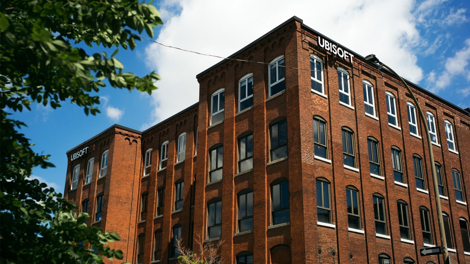 Ubisoft's Montreal office, with employees working remotely, highlighting the company's shift towards a return-to-office mandate, a move that has sparked controversy in the gaming industry, with many analysing the impact on work-life balance and productivity