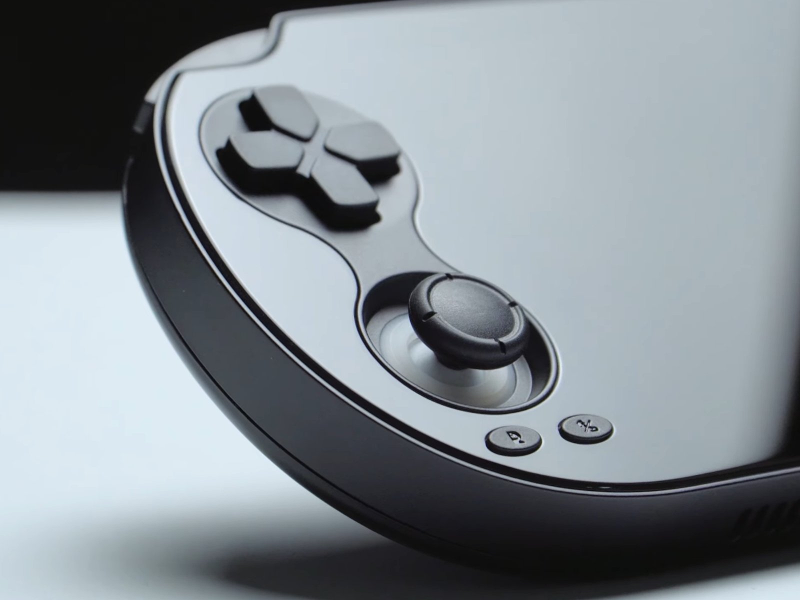 The Anbernic RG Vita and RG Vita Pro gaming handhelds feature full glass fronts and sleek designs, inspired by the PlayStation Vita, offering a premium gaming experience with a nostalgic twist, perfect for gamers on-the-go