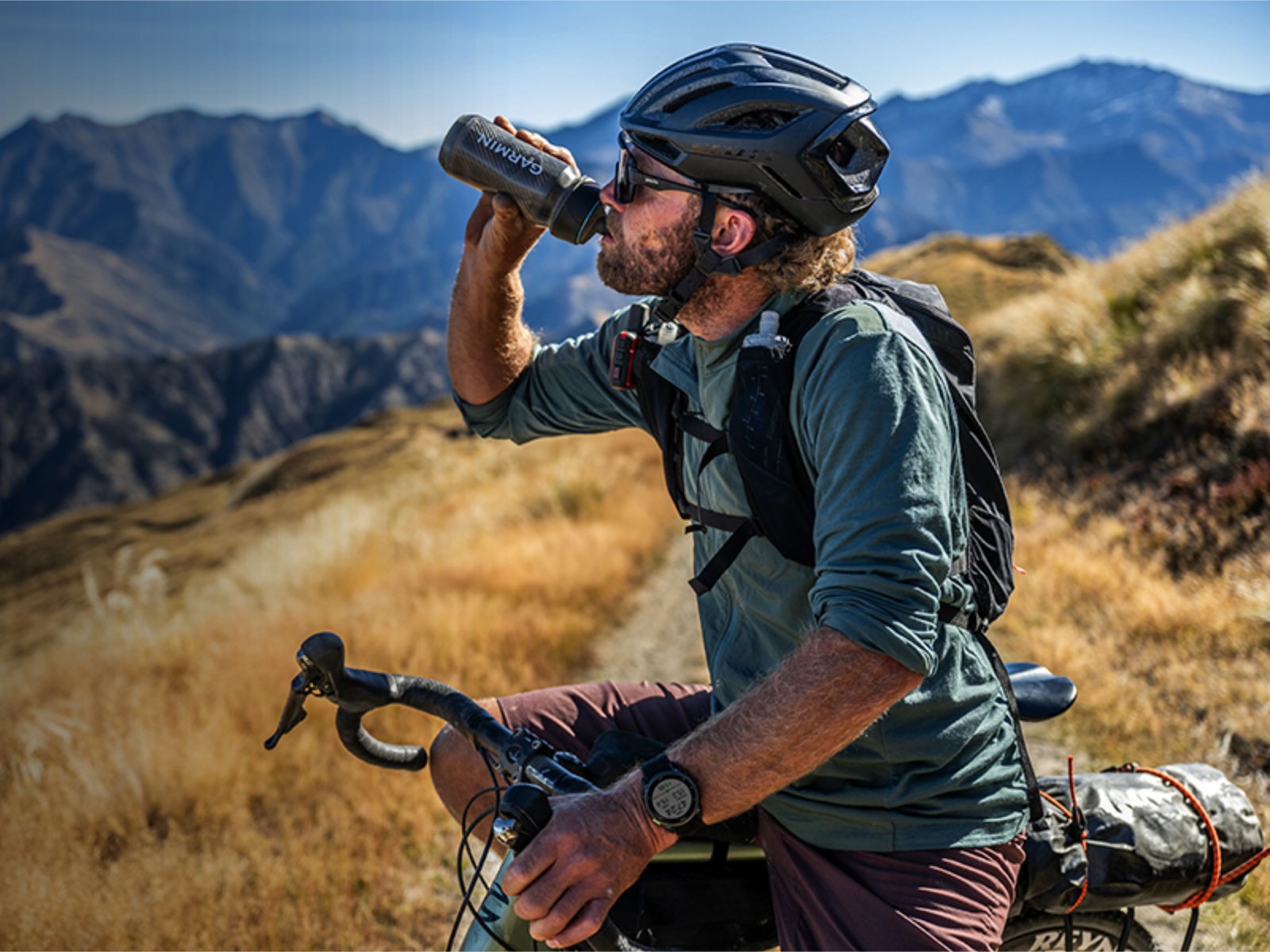 Garmin smartwatch on a person's wrist, displaying a workout tracking screen with the new update, featuring a more intuitive interface and enhanced features, allowing for a more seamless and efficient workout experience with the primary keyword Garmin smartwatches