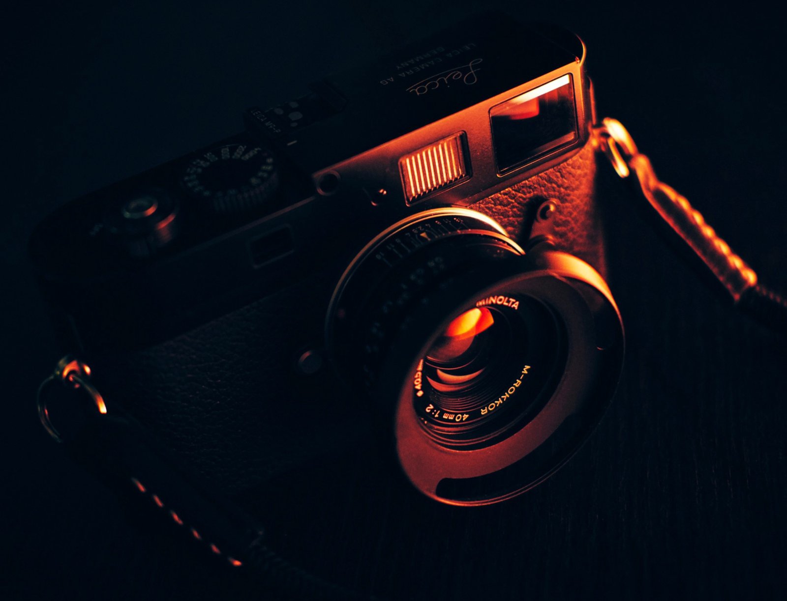 A compact camera with interchangeable lenses, representing the growing demand for high-quality cameras with creative control, featuring a mirrorless design