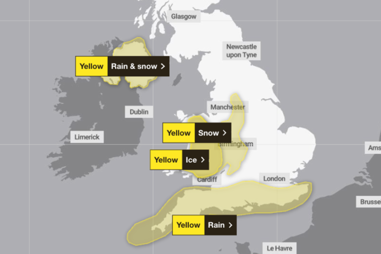 A scenic view of the UK countryside covered in a thick layer of snow, with the sky a deep grey colour, as Storm Pedro brings heavy rain and snow to the country, affecting the behaviour of residents and the colour of the landscape