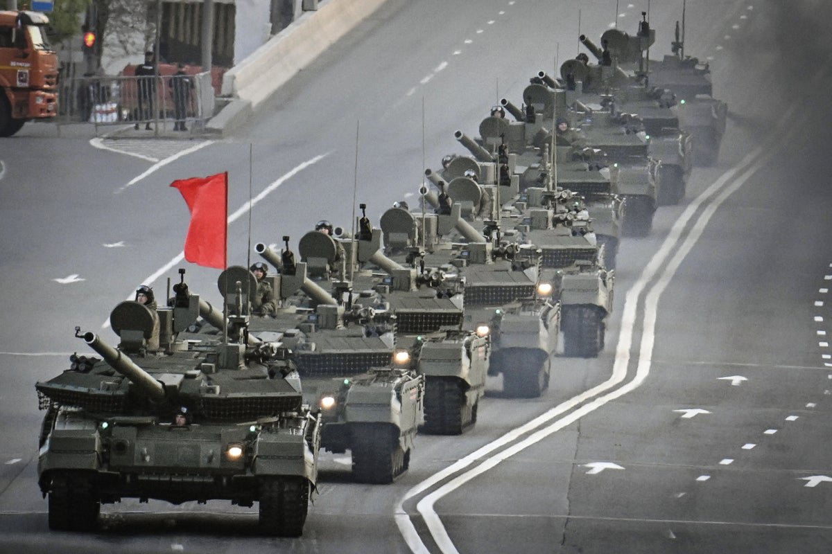 A descriptive image of a wargame simulation, depicting a potential invasion of a Nato country by Russia, with a focus on the humanitarian crisis aspect, highlighting the complexities of the situation and the need for diplomacy and preparedness