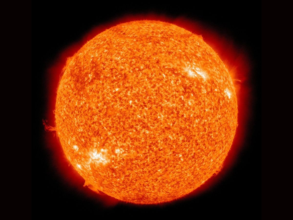 A massive sunspot, approximately 15 times larger than Earth, is visible on the surface of the Sun, with its enormous size and intense magnetic activity making it a significant event in the world of astronomy, allowing scientists to analyse its behaviour and better understand the complex dynamics of our star, with the primary keyword being sunspot