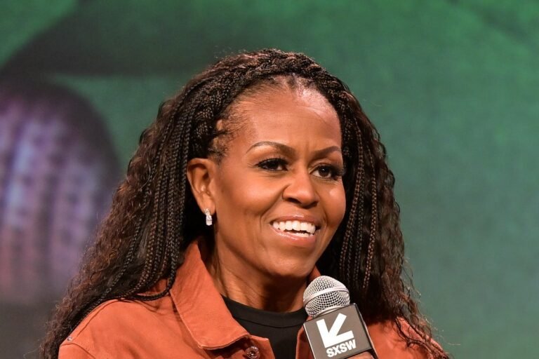 Michelle Obama's documentary poster, featuring the former first lady with a bright smile and a colourful background, symbolising her vibrant personality and inspiring story, available to stream on Netflix, with a captivating narrative that explores her behaviour, experiences, and colour