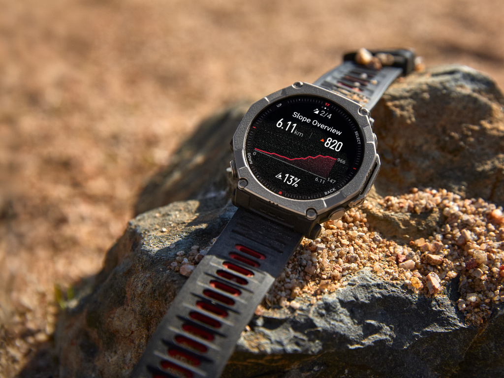 The Amazfit T-Rex Ultra 2 smartwatch with a 3000-nit sapphire display and Grade-5 titanium build, featuring a 300-lux LED flashlight and 64 GB storage for topo maps, perfect for hiking and outdoor activities