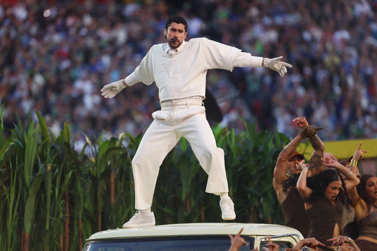 Bad Bunny performs at the halftime show, surrounded by colourful costumes and dancers, in a celebration of Latinx culture and music
