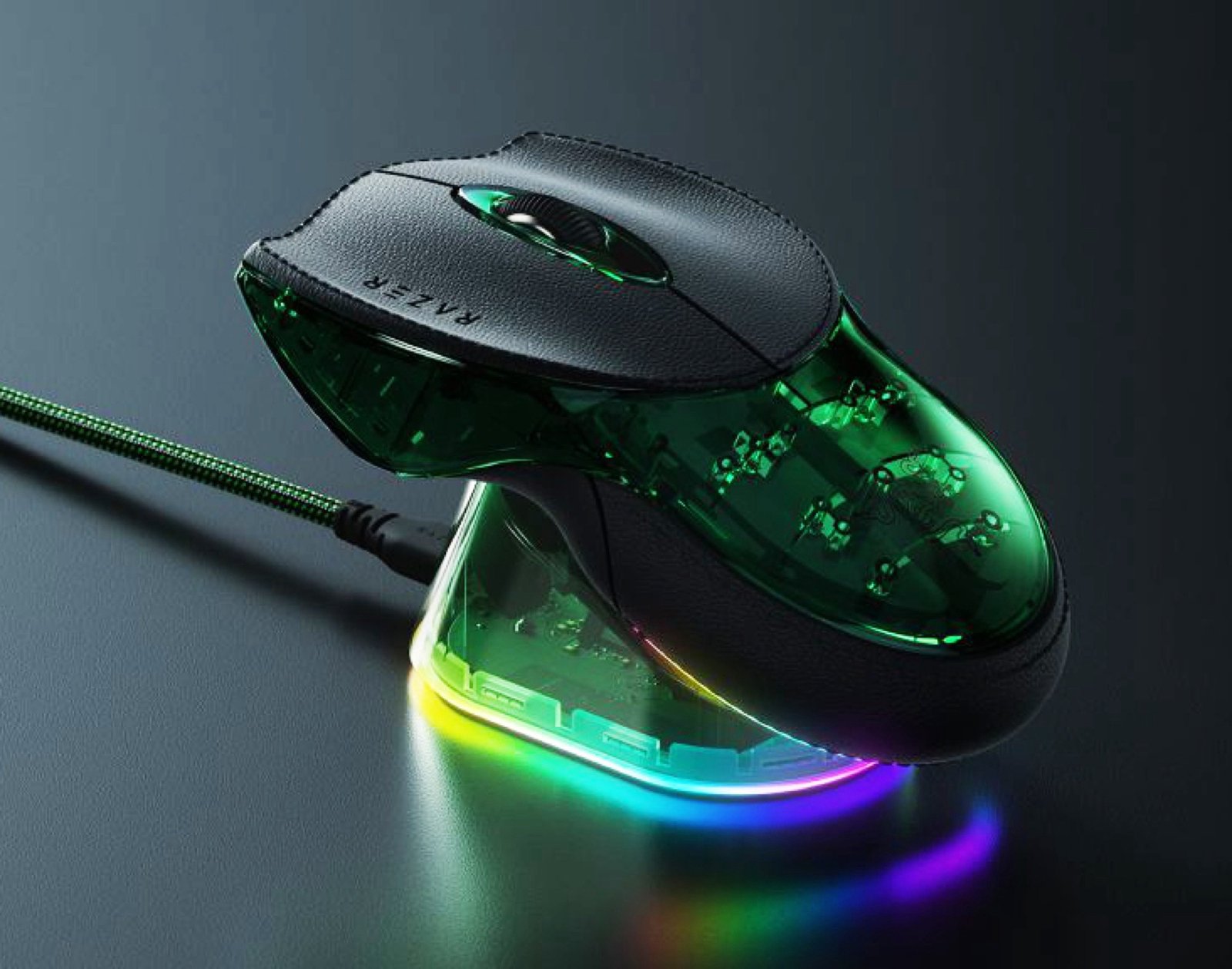 The Razer Boomslang gaming mouse features a transparent chassis with RGB lighting and faux-leather buttons, offering a unique blend of style and performance, with a primary focus on the Razer Boomslang gaming mouse
