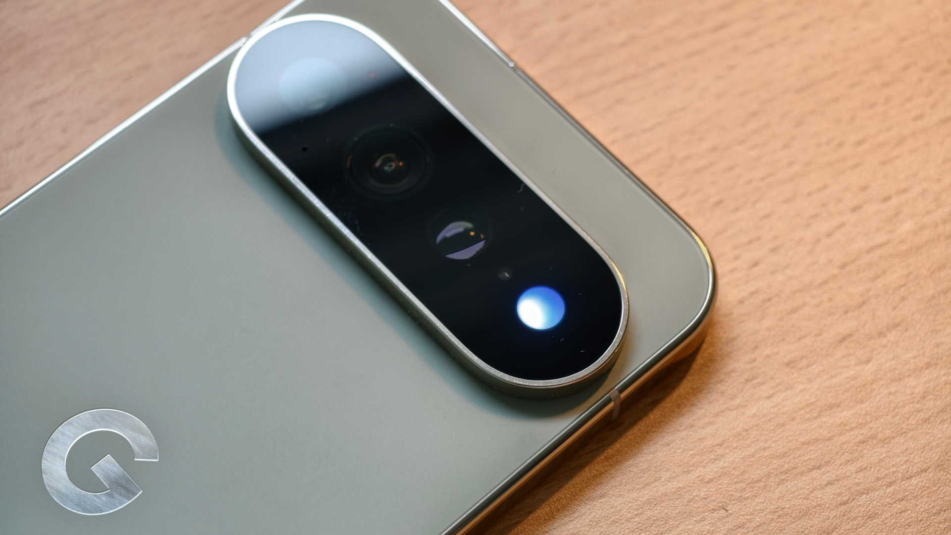 Close-up of Google Pixel 11 Pro back showing camera flash housing the HiLight notification light