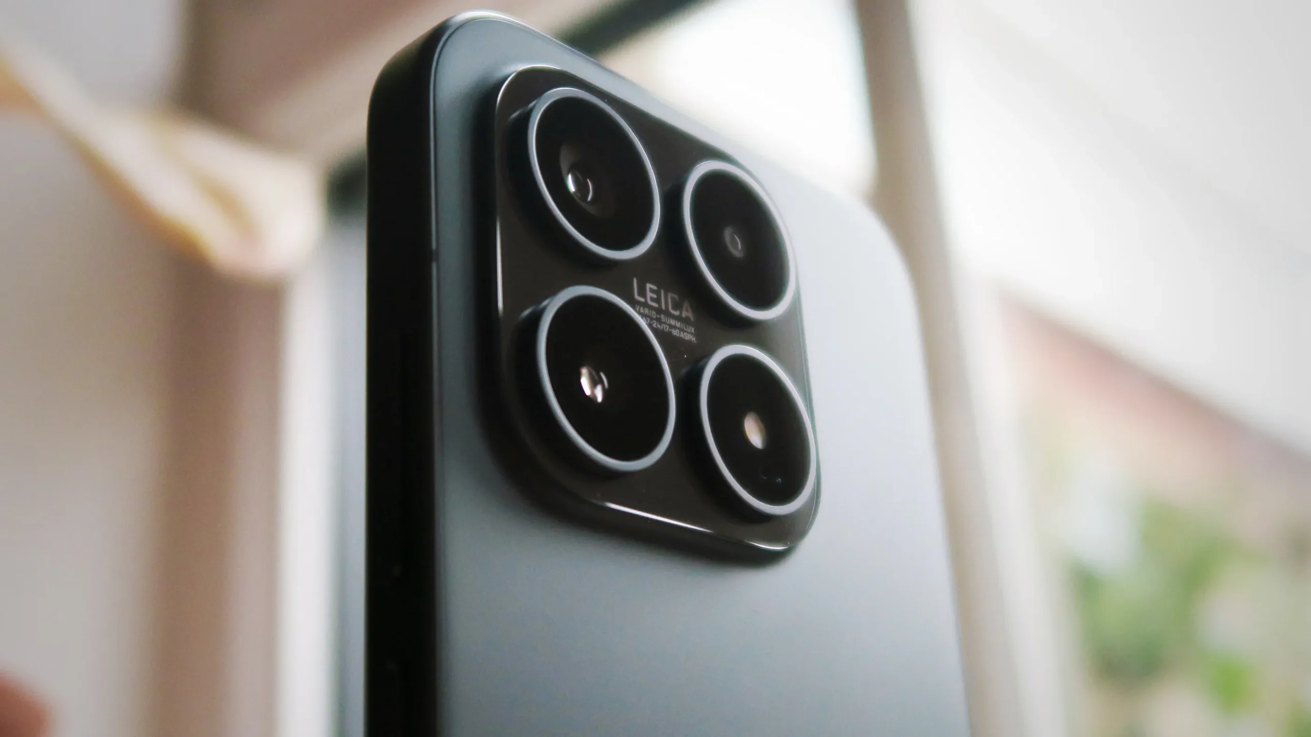 Xiaomi 18 smartphone showing its dual 200MP camera module and compact design