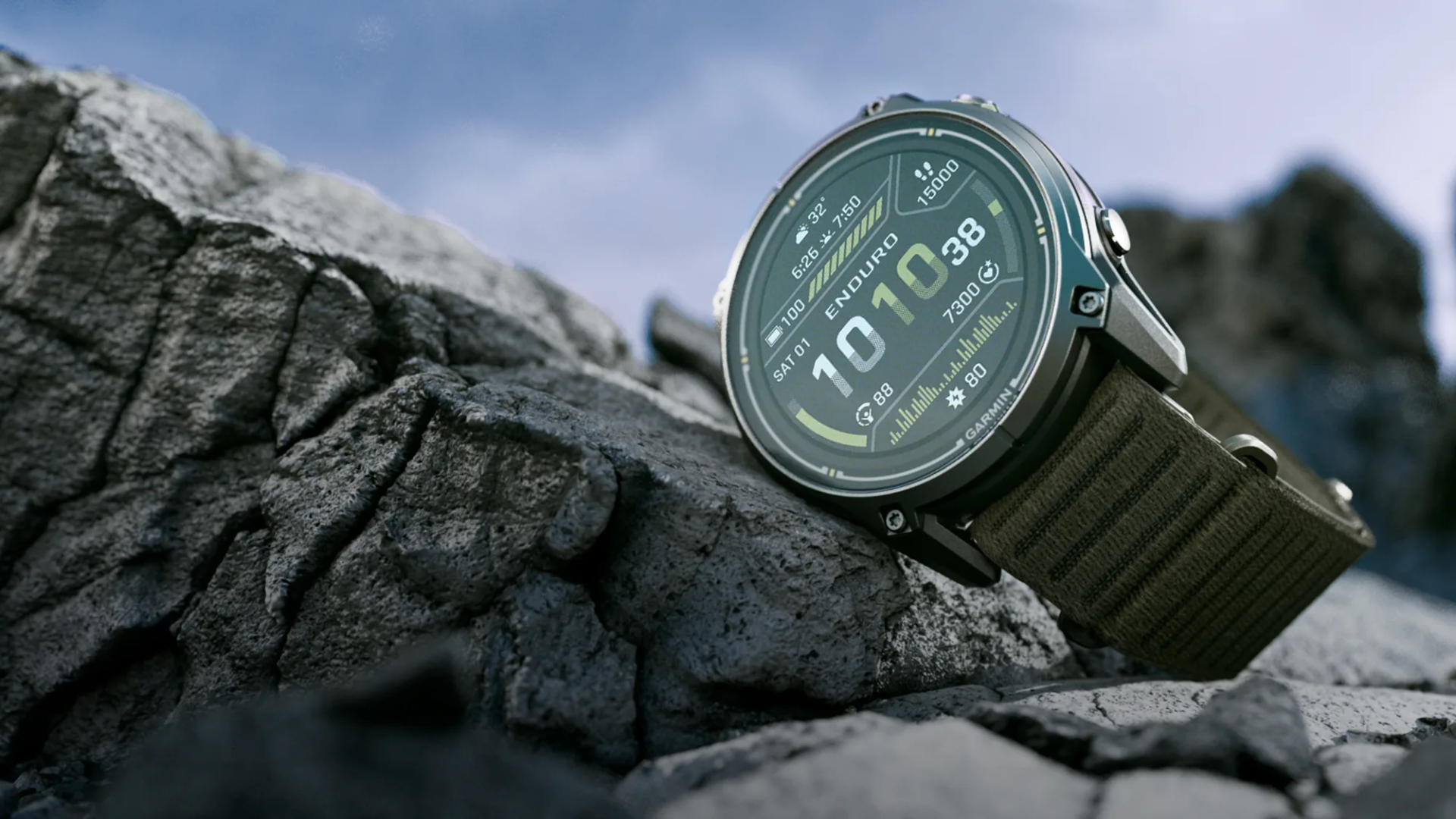 Garmin Enduro 4 smartwatch with bright display and rugged strap on a mountain trail