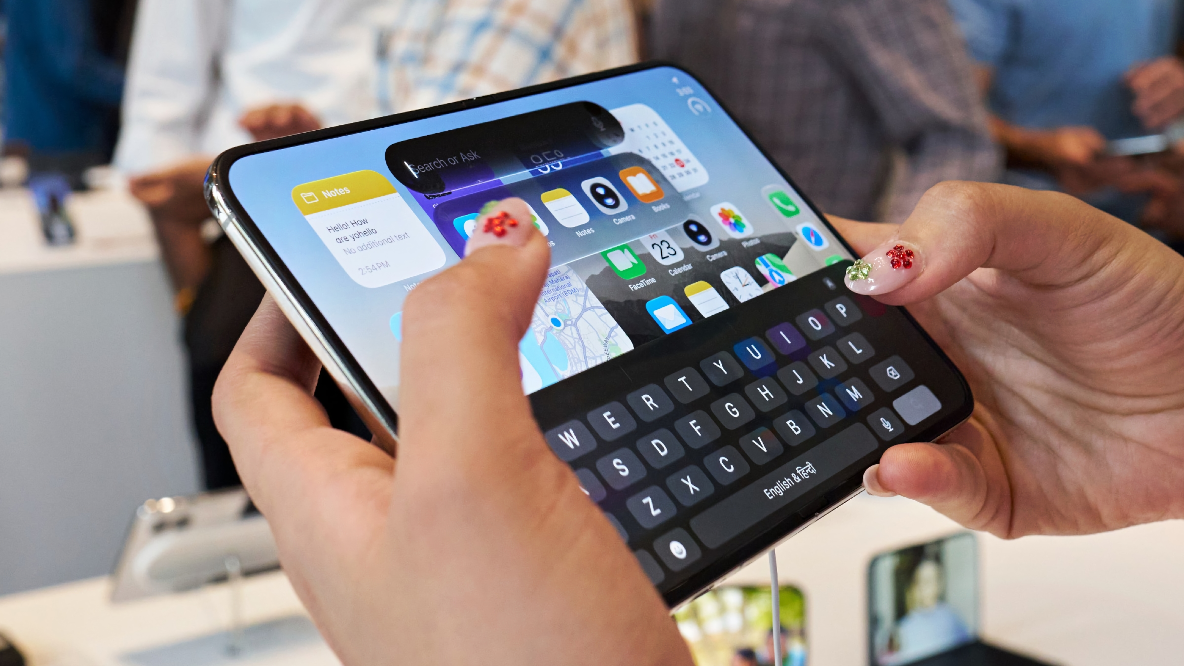 Screenshot of iOS 26 running on a Microsoft Surface Duo foldable device, displaying iPhone 17 Pro Max UI