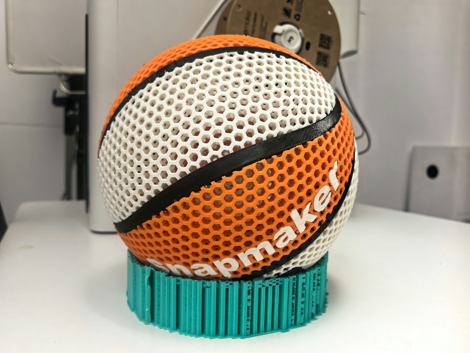 A close-up of a 3D printed object created using the proximal sound printing technique, showcasing its intricate details and precise colour and texture, with a focus on the primary keyword of sound-based 3D printing