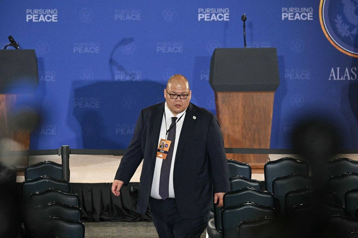 A photo of a person looking at a file with a shocked expression, representing the public's reaction to the Epstein files controversy and the communications chief's derogatory slur, which has sparked a wider conversation about the behaviour of those in power