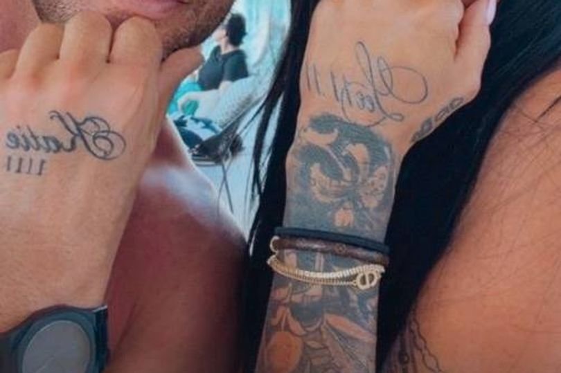 Katie Price and her new husband pose for a photo, sparking speculation about the nature of their relationship, with some viewing it as a business transaction rather than a romantic partnership, as they navigate the challenges of celebrity marriage