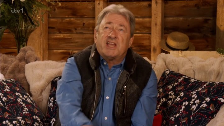 A descriptive image of the Bridgerton cast, featuring Ben Miller as Lord Featherington, highlighting the show's scandalous hanky panky and intricate costume design, set against the backdrop of Regency-era London