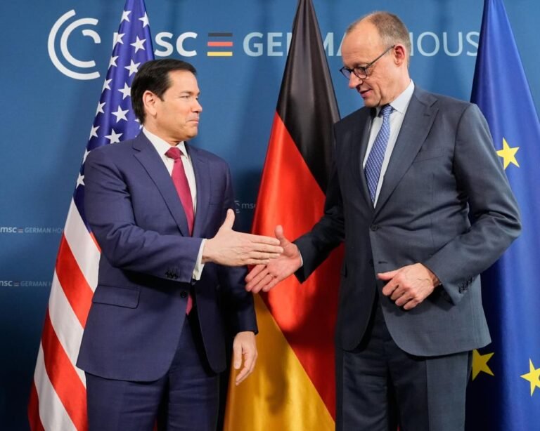 A descriptive image of the European Union flag waving in the wind, symbolising the continent's growing sense of steeliness and unity in the face of Trump's new era, with a focus on trade policies and national security