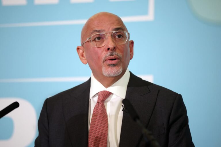 Nadhim Zahawi walking in London, surrounded by people, with a mix of concerned and puzzled expressions, highlighting the controversy over his safety comments in the UK city, with a focus on London safety and behaviour