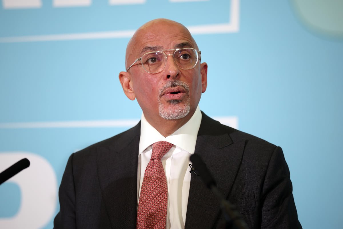 Nadhim Zahawi walking in London, surrounded by people, with a mix of concerned and puzzled expressions, highlighting the controversy over his safety comments in the UK city, with a focus on London safety and behaviour