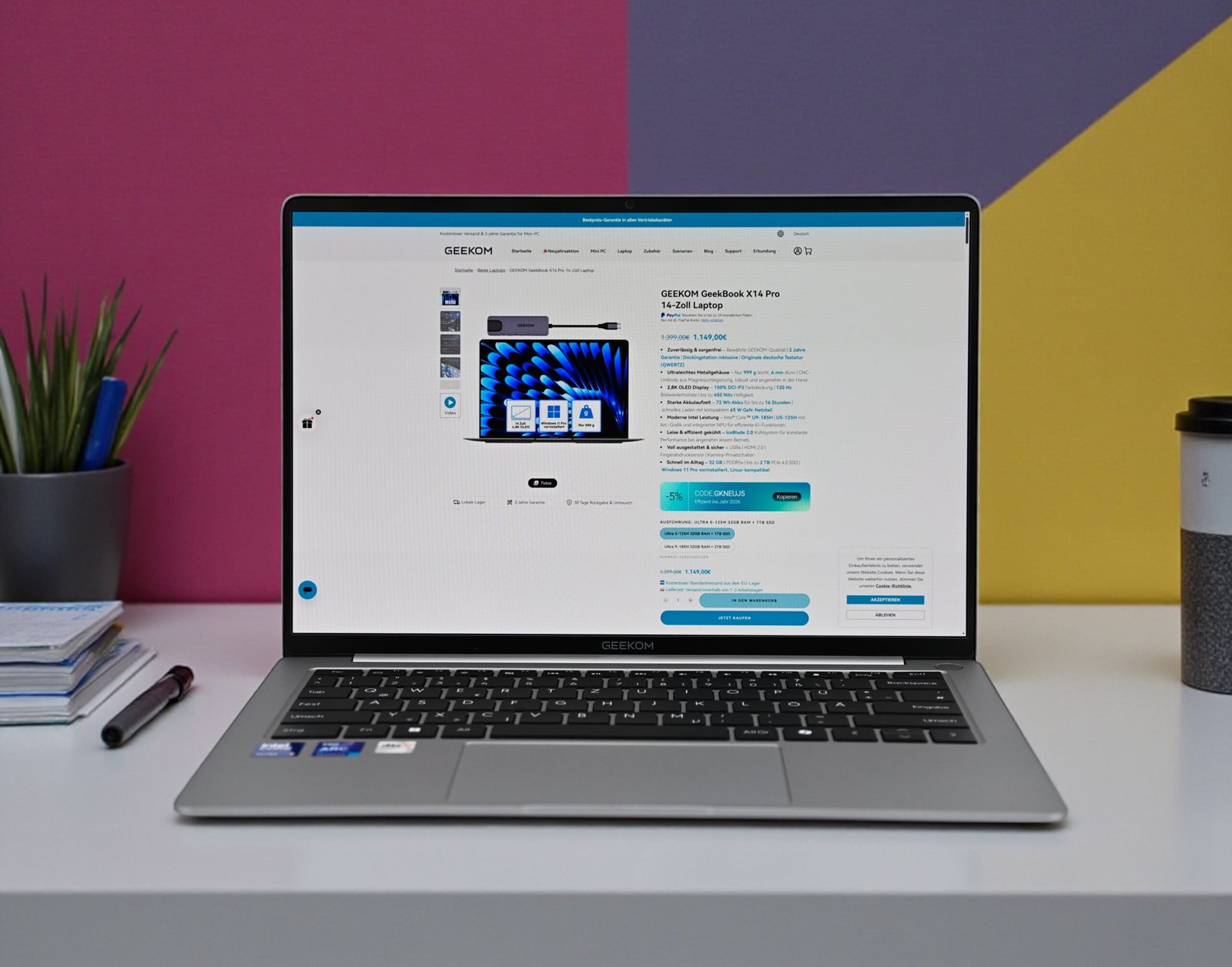 The GeekBook X14 Pro ultra-light laptop features a stunning 14-inch OLED display, Intel Core Ultra 9 processor, and a sleek, compact design, making it perfect for professionals and gamers alike, with a primary focus on portability and performance, and a colour scheme that exudes style and sophistication