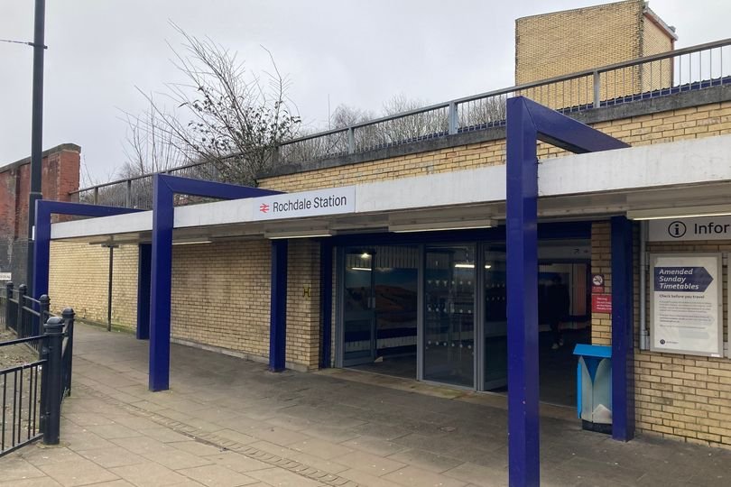 A photograph of Rochdale station, showing the locked entrance and frustrated commuters, highlighting the primary keyword 'Rochdale station' and the impact of its closure on daily commuters
