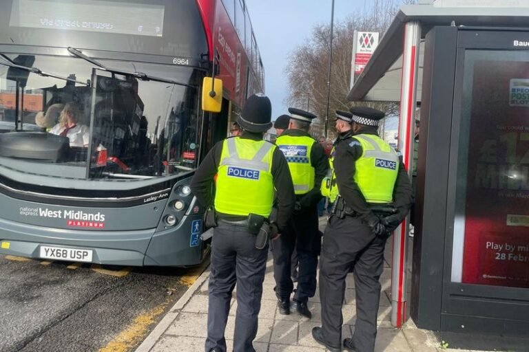 A Birmingham bus with a police car in the background, symbolising the increased police presence on the city's most dangerous bus route, with a focus on safety and security for passengers