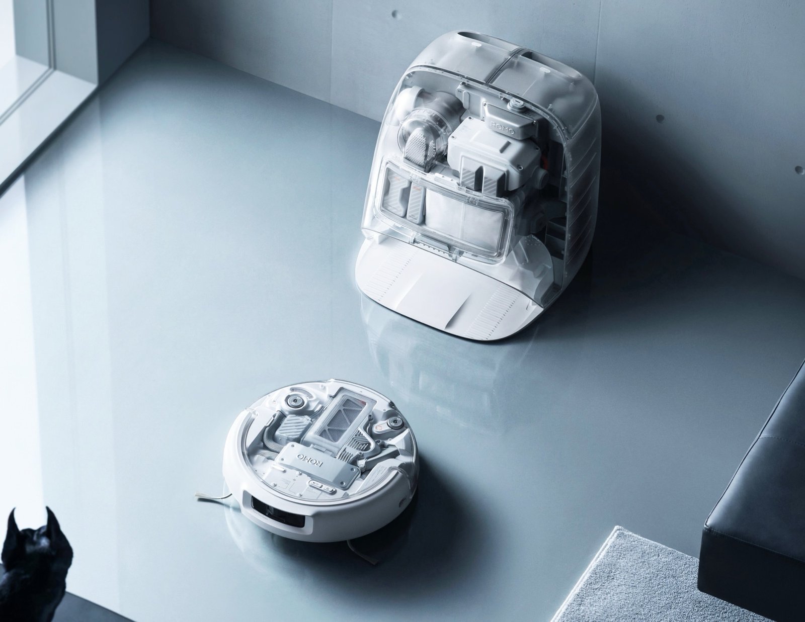 A DJI Romo robot vacuum being controlled by a DualSense PS5 controller, with a backdrop of multiple robot cameras, highlighting the security flaw in the system and the importance of smart home security